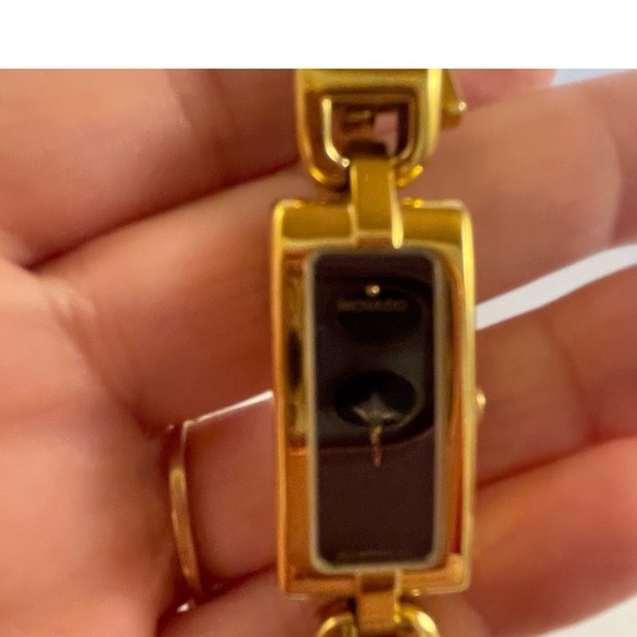 Like New!! Movado rectangle black dial with yellow gold bracelet watch. - Picture 7 of 8